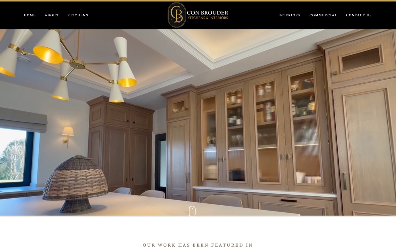 The Con Brouder Kitchens & Interiors website, built by Baker Media, on a laptop